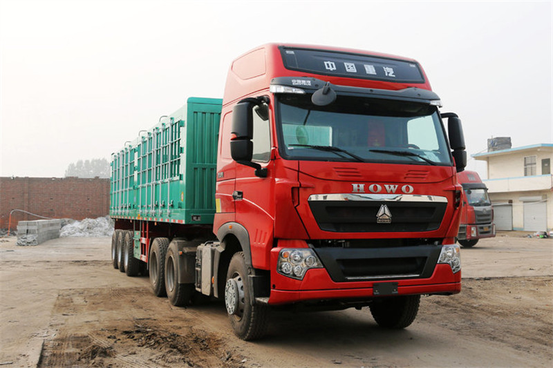 中国重汽 HOWO T7H重卡 440马力 6X4 国四牵引车(MCY11双后桥)(高顶)(ZZ4257V324HD1B)